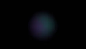 Dark minimalist desktop wallpaper with a soft indigo and teal gradient orb glowing on near-black