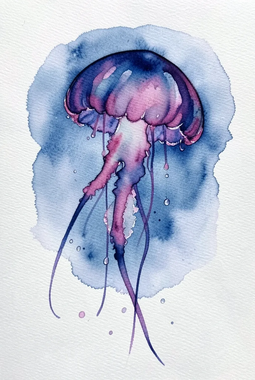 A watercolor jellyfish with a translucent bell and trailing tentacles in deep blue and pink.