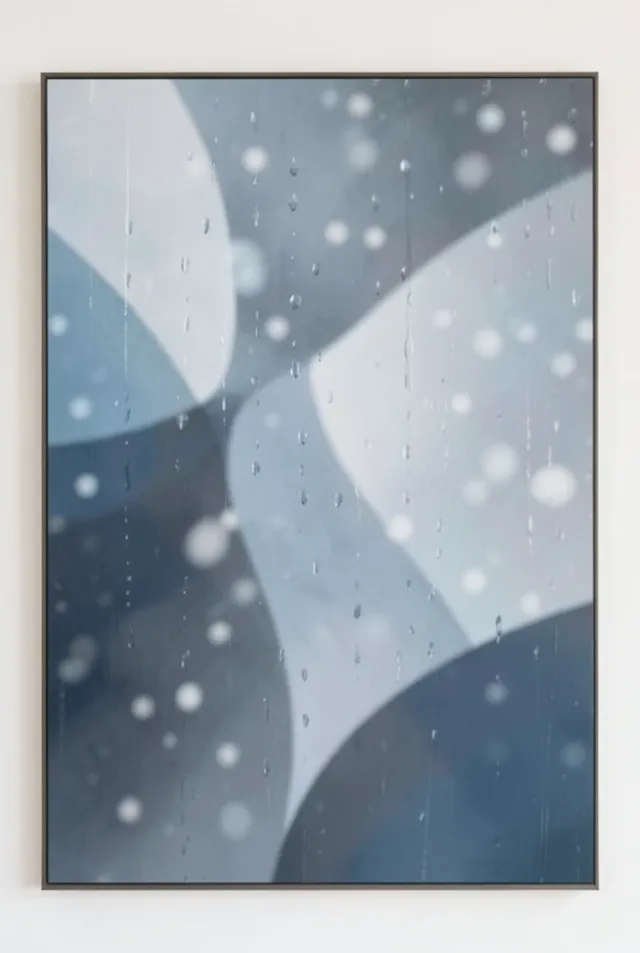 Soft abstract rainy day with curved grey, blue, and white shapes suggesting rain on glass