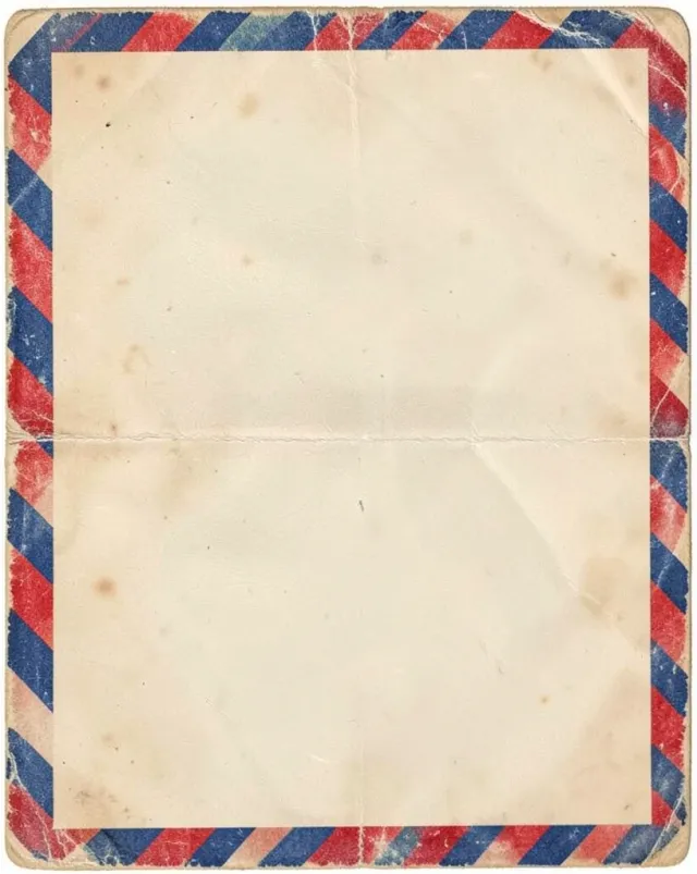 Vintage air mail envelope with red and blue border stripes and blank address area